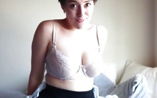 Chubby babe strips naked and fingers her pussy hole